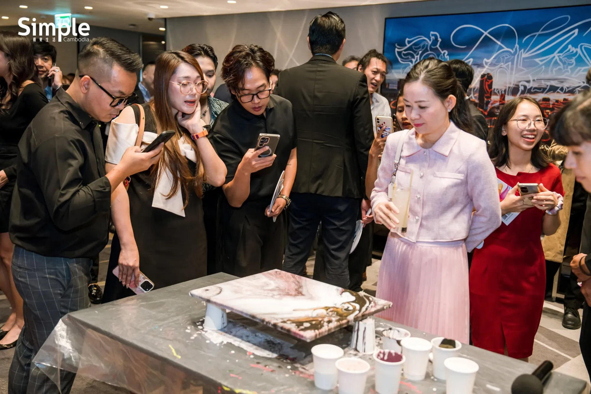 Live fluid-art demonstration with guests